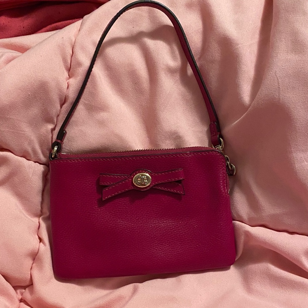 Elegant Pink Handbag with Bow Accent